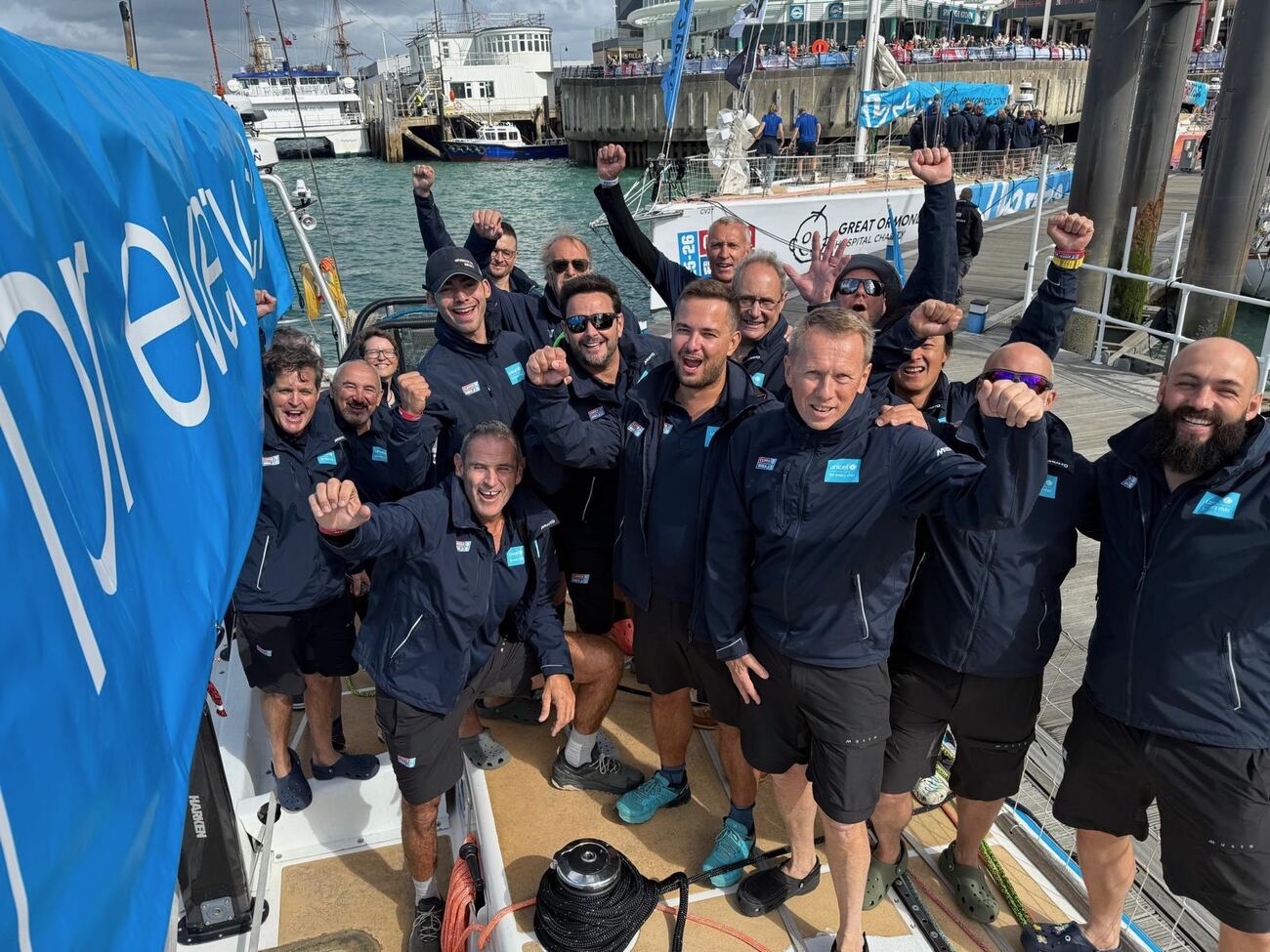 The team gathered on deck